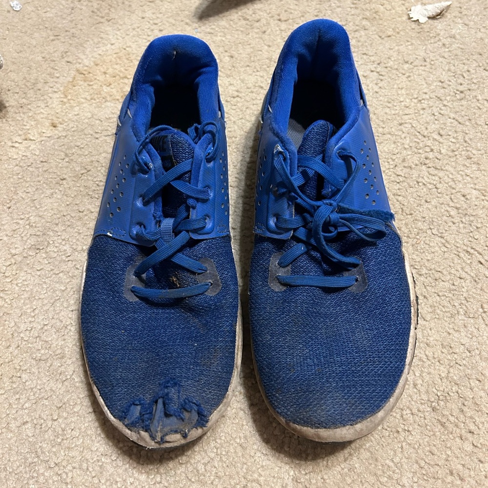Well worn women’s workout sneaker shoes